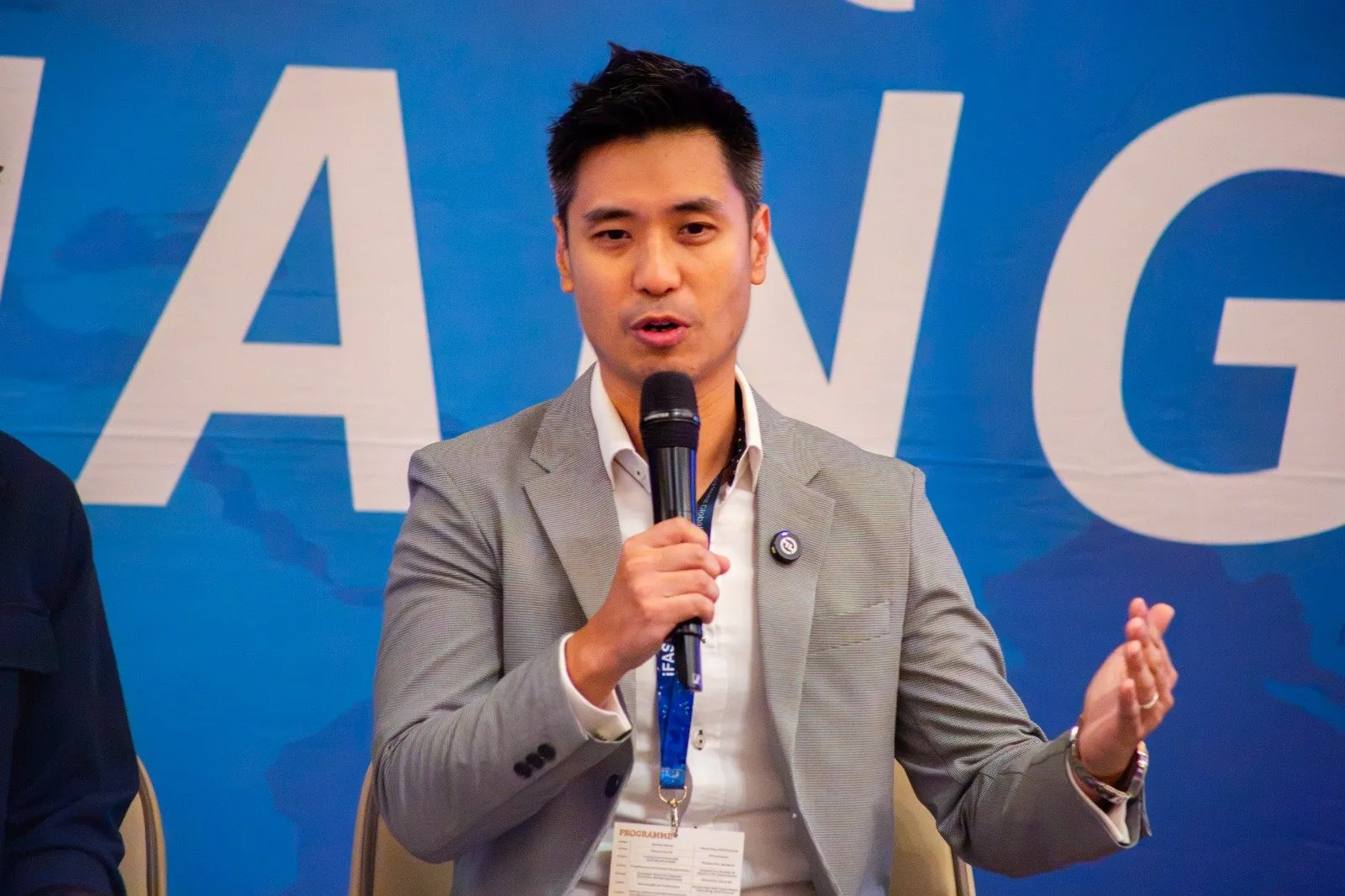 Ling Chun Wei speaking on a panel at the iFAST Adviser Xchange 2026